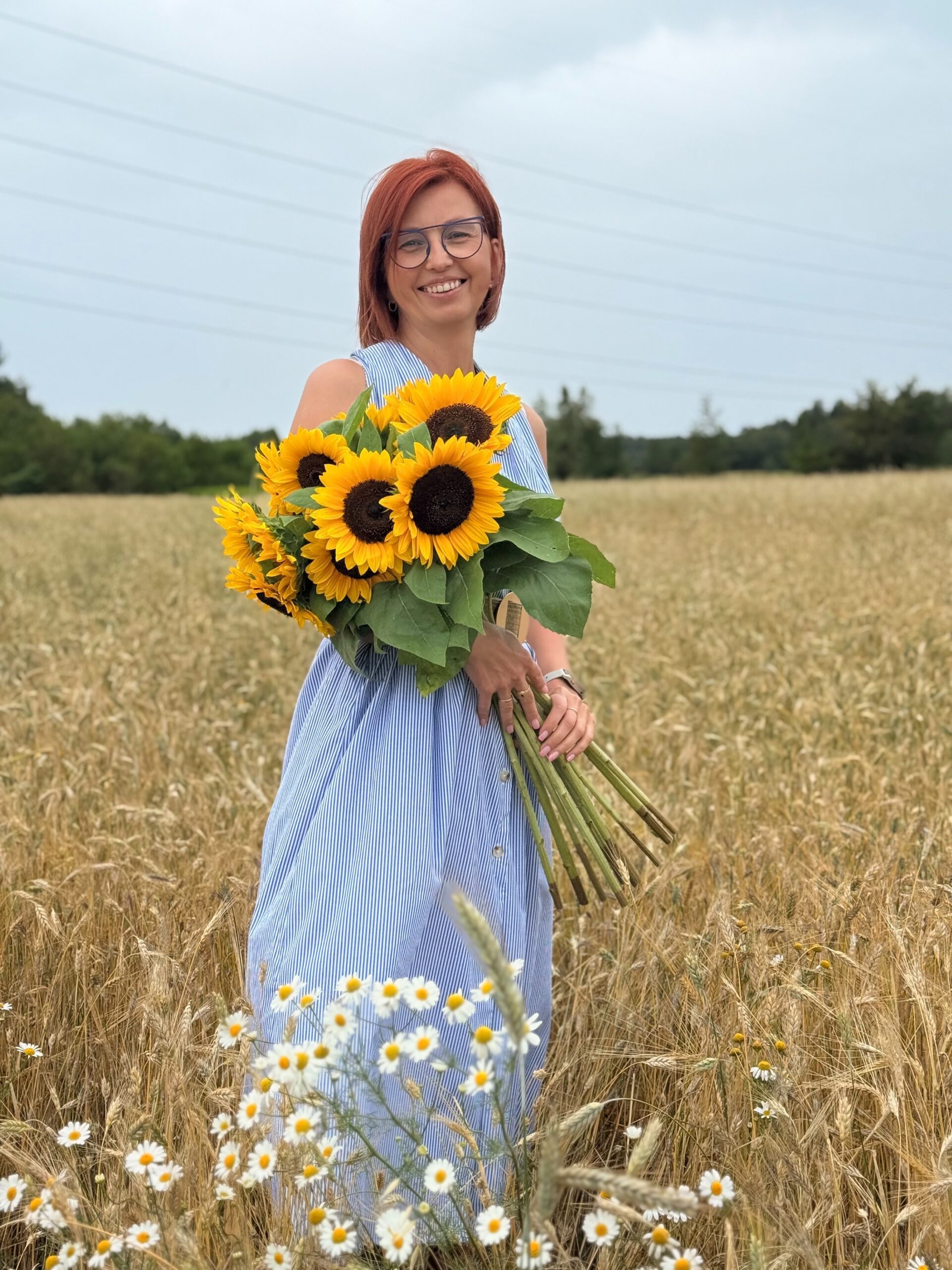 Renata Rejf w słonecznikach